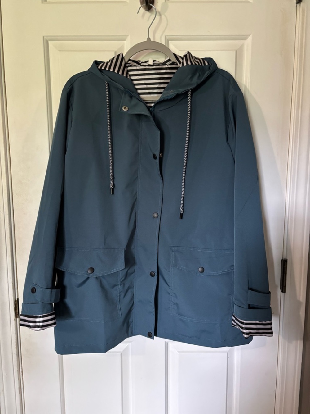 Ladies Blue Hooded Raincoat - black & white stripes inside. Worn 2-3x. Large.